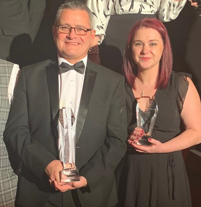 Gary Carmichael and Cassie McMullin pictured with the coveted trophies. Overall “Business of The Year” and “Manufacturer Of The Year.”